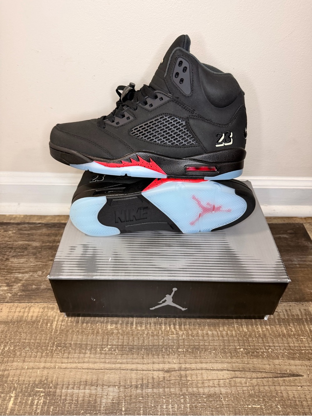 Jordan Retro High-Top Sneakers in Black with Red and Icy Blue Accents